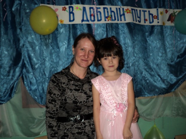 С младшей дочерью Оленькой.